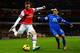 LONDON, ENGLAND - DECEMBER 08: Steven Pienaar of Everton goes into to block the cross from Carl Jenkinson of Arsenal during the Barclays Premier League match between Arsenal and Everton at Emirates Stadium on December 8, 2013 in London, England. (Photo