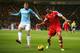 SOUTHAMPTON, ENGLAND - DECEMBER 07: Dejan Lovren of Southampton is challenged by Edin Dzeko of Manchester City during the Barclays Premier League match between Southampton and Manchester City at St Mary's Stadium on December 7, 2013 in Southampton, Engla