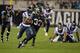 Dec 5, 2013; Jacksonville, FL, USA; Jacksonville Jaguars running back Maurice Jones-Drew (32) is pursued by Houston Texans cornerback Brice McCain (21) at EverBank Field. The Jaguars defeated the Texans 27-20. Mandatory Credit: Kirby Lee-USA TODAY Sports