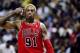 29 Nov 1997: Forward Dennis Rodman of the Chicago Bulls stands on the court during a game against the Washington Wizards at the US Airways Arena in Landover, Maryland. The Bulls won the game 88-83. Mandatory Credit: Doug Pensinger /Allsport