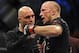 Nov 16, 2013; Las Vegas, NV, USA; Georges St-Pierre is interviewed by Joe Rogan after his welterweight championship bout against Johny Hendricks during UFC 167 at MGM Grand Garden Arena. Mandatory Credit: Stephen R. Sylvanie-USA TODAY Sports