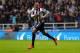 NEWCASTLE UPON TYNE, ENGLAND - NOVEMBER 02: Loic Remy of Newcastle United celebrates scoring their second goal during the Barclays Premier League match between Newcastle United and Chelsea at St James' Park on November 2, 2013 in Newcastle upon Tyne, Eng
