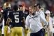 Jan 7, 2013; Miami, FL, USA; Notre Dame Fighting Irish head coach Brian Kelly congratulates quarterback Everett Golson (5) after a touchdown against the Alabama Crimson Tide during the second half of the 2013 BCS Championship game at Sun Life Stadium. M