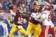 Dec 8, 2013; Landover, MD, USA; Washington Redskins quarterback Kirk Cousins (12) throws the ball against the Kansas City Chiefs in the fourth quarter at FedEx Field. The Chiefs won 45-10. Mandatory Credit: Geoff Burke-USA TODAY Sports