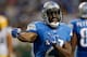 DETROIT, MI - NOVEMBER 28: Reggie Bush #21 of the Detroit Lions reacts after a second quarter reception and long run while playing the Green Bay Packers at Ford Field on November 28, 2013 in Detroit, Michigan. (Photo by Gregory Shamus/Getty Images)