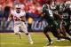 Dec 7, 2013; Indianapolis, IN, USA; Ohio State Buckeyes running back Carlos Hyde (34) runs the ball during the third quarter of the 2013 Big 10 Championship game against the Michigan State Spartans at Lucas Oil Stadium. Mandatory Credit: Andrew Weber-USA
