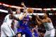 BOSTON, MA - DECEMBER 13: Andrea Bargnani #77 of the New York Knicks is surrounded by members of the Boston Celtics underneath the basket in the second half during the game at TD Garden on December 13, 2013 in Boston, Massachusetts. NOTE TO USER: User exp