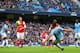 MANCHESTER, ENGLAND - DECEMBER 14: Sergio Aguero of Manchester City scores the opening goal during the Barclays Premier League match between Manchester City and Arsenal at Etihad Stadium on December 14, 2013 in Manchester, England. (Photo by Clive Brunski