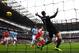 MANCHESTER, ENGLAND - DECEMBER 14: Wojciech Szczesny of Arsenal can't stop Sergio Aguero of Manchester City (obstructed view) scoring their first goal during the Barclays Premier League match between Manchester City and Arsenal at Etihad Stadium on Decemb