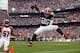 CLEVELAND, OH - SEPTEMBER 29: Fullback Chris Ogbonnaya #25 of the Cleveland Browns celebrates after scoring a touchdown in front of linebacker Vincent Rey #57 of the Cincinnati Bengals at FirstEnergy Stadium on September 29, 2013 in Cleveland, Ohio. (Ph