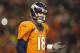 Dec 12, 2013; Denver, CO, USA; Denver Broncos quarterback Peyton Manning (18) reacts during the second half against the San Diego Chargers at Sports Authority Field at Mile High. The Chargers won 27-20. Mandatory Credit: Chris Humphreys-USA TODAY Sports