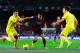 BARCELONA, SPAIN - DECEMBER 14: Alexis Sanchez of FC Barcelona duels for the ball with Hernan Perez (L) and Tomas Pina of Villarreal CF during the La Liga match between FC Barcelona and Villarreal CF at Camp Nou on December 14, 2013 in Barcelona, Spain.