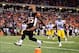 Sep 16, 2013; Cincinnati, OH, USA; Cincinnati Bengals running back Giovani Bernard (25) high steps into the end zone for a touchdown during the third quarter against the Pittsburgh Steelers at Paul Brown Stadium. Mandatory Credit: Andrew Weber-USA TODAY S