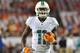 TAMPA, FL - NOVEMBER 11: Wide receiver Mike Wallace #11 of the Miami Dolphins warms up for play against the Tampa Bay Buccaneers November 11, 2013 at Raymond James Stadium in Tampa, Florida. Tampa won 22 - 19. (Photo by Al Messerschmidt/Getty Images)
