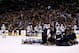 BOSTON, MA - DECEMBER 07: Brooks Orpik #44 of the Pittsburgh Penguins is tended to by the medical staff on the ice in the first period after an altercation with Shawn Thornton #22 of the Boston Bruins in the first period during the game at TD Garden on D