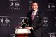 NEW YORK, NY - DECEMBER 08: Quarterback Johnny Manziel of the Texas A&M University Aggies poses with the Heisman Memorial Trophy after being named the 78th Heisman Memorial Trophy Award winner at a press conference after at the Marriott Marquis on Decemb