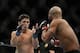 December 14, 2013; Sacramento, CA, USA; Demetrious Johnson (red gloves) fights Joseph Benavidez (blue gloves) during the flyweight championship bout of the UFC on FOX 9 at Sleep Train Arena. Mandatory Credit: Kyle Terada-USA TODAY Sports