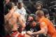 Johnson checks on Benavidez after knocking him out.