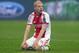 MILAN, ITALY - DECEMBER 11: Davy Klaassen of Ajax Amsterdam dejected at the end of the UEFA Champions League Group H match between AC Milan and Ajax Amsterdam at Stadio Giuseppe Meazza on December 11, 2013 in Milan, Italy. (Photo by Claudio Villa/Getty