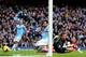 MANCHESTER, ENGLAND - DECEMBER 14: Laurent Koscielny of Arsenal fails to stop Alvaro Negredo of Manchester City scoring their second goal during the Barclays Premier League match between Manchester City and Arsenal at Etihad Stadium on December 14, 2013