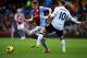 BIRMINGHAM, ENGLAND - DECEMBER 15: Marc Albrighton of Aston Villa evades Wayne Rooney of Manchester United during the Barclays Premier League match between Aston Villa and Manchester United at Villa Park on December 15, 2013 in Birmingham, England. (Pho