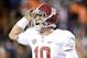 Nov 30, 2013; Auburn, AL, USA; Alabama Crimson Tide quarterback AJ McCarron (10) celebrates after a 99 yard touchdown by wide receiver Amari Cooper (not pictured) against the Auburn Tigers during the fourth quarter at Jordan Hare Stadium. Mandatory Credit