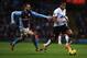 BIRMINGHAM, ENGLAND - DECEMBER 15: Luis Antonio Valencia of Manchester United is chased by Antonio Luna of Aston Villa during the Barclays Premier League match between Aston Villa and Manchester United at Villa Park on December 15, 2013 in Birmingham, En