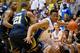DURHAM, NC - DECEMBER 03: Jabari Parker #1 of the Duke Blue Devils drives the baseline against Zak Irvin #21 of the Michigan Wolverines during play at Cameron Indoor Stadium on December 3, 2013 in Durham, North Carolina. Duke won 79-69. (Photo by Grant