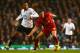 LONDON, ENGLAND - DECEMBER 15: Jordan Henderson of Liverpool is marked by Mousa Dembele of Tottenham Hotspur during the Barclays Premier League match between Tottenham Hotspur and Liverpool at White Hart Lane on December 15, 2013 in London, England. (Pho
