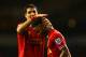 LONDON, ENGLAND - DECEMBER 15: Luis Suarez of Liverpool congratulates Raheem Sterling of Liverpool on scoring their fifth goal during the Barclays Premier League match between Tottenham Hotspur and Liverpool at White Hart Lane on December 15, 2013 in Lon