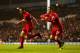 LONDON, ENGLAND - DECEMBER 15: Jon Flanagan of Liverpool celebrates scoring their third goal with Joe Allen of Liverpool during the Barclays Premier League match between Tottenham Hotspur and Liverpool at White Hart Lane on December 15, 2013 in London,