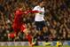 LONDON, ENGLAND - DECEMBER 15: Lucas Leiva of Liverpool marshalls Mousa Dembele of Tottenham Hotspur during the Barclays Premier League match between Tottenham Hotspur and Liverpool at White Hart Lane on December 15, 2013 in London, England. (Photo by P