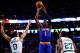 BOSTON, MA - DECEMBER 13: Amar'e Stoudemire #1 of the New York Knicks takes a shot in front of Avery Bradley #0 of the Boston Celtics in the second half during the game at TD Garden on December 13, 2013 in Boston, Massachusetts. NOTE TO USER: User express
