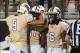 November 21, 2013; Orlando, FL, USA; UCF Knights wide receiver Breshad Perriman (11) is congratulated on a touchdown by wide receiver J.J. Worton (9) and wide receiver Rannell Hall (6) against the Rutgers Scarlet Knights at Bright House Networks Stadium.