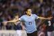 MONTEVIDEO, URUGUAY - OCTOBER 15: Edinson Cavani (#21) of Uruguay celebrates a goal during a match between Uruguay and Argentina as part of the 18th round of the South American Qualifiers for the FIFA's World Cup Brazil 2014 at Centenario Stadium Stadium