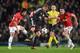 MANCHESTER, ENGLAND - SEPTEMBER 17: Shinji Kagawa of Manchester United competes with Stefan Kiessling of Bayer Leverkusen during the UEFA Champions League Group A match between Manchester United and Bayer Leverkusen at Old Trafford on September 17, 2013