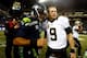 SEATTLE, WA - DECEMBER 02: Quarterback Russell Wilson #3 of the Seattle Seahawks and quarterback Drew Brees #9 of the New Orleans Saints meet on the field after the Seattle Seahawks defeated the New Orleans Saints 34-7 in a game at CenturyLink Field on D