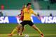 AGADIR, MOROCCO - DECEMBER 14: Xiaoting Feng of Guangzhou runs with the ball during the FIFA Club World Cup quarterfinal match between Guangzhou Evergrande FC and Al-Ahly SC at Agadir Stadium on December 14, 2013 in Agadir, Morocco. (Photo by Lars Baron