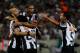 RIO DE JANEIRO, BRAZIL - NOVEMBER 30: Players of Atletico Mineiro celebrate a scored goal against Fluminense during the match between Fluminense and Atletico Mineiro for the Brazilian Series A 2013 at Maracana on November 30, 2013 in Rio de Janeiro, Bra