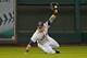 HOUSTON, TX - JULY 23: Brandon Barnes #2 of the Houston Astros makes a diving catch in center field during the fourth inning against the Oakland Athletics at Minute Maid Park on July 23, 2013 in Houston, Texas. (Photo by Scott Halleran/Getty Images)