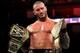Randy Orton eyes his new championship.