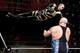 Goldust soars toward Big Show.