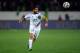 AGADIR, MOROCCO - DECEMBER 14: Mohsine Moutaouali of Casablanca runs with the ball during the FIFA Club World Cup Quarterfinal match between Raja Casablanca and CF Monterrey at Agadir Stadium on December 14, 2013 in Agadir, Morocco. (Photo by Lars Baron/