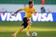 AGADIR, MOROCCO - DECEMBER 14: Linpeng Zhang of Guangzhou runs with the ball during the FIFA Club World Cup quarterfinal match between Guangzhou Evergrande FC and Al-Ahly SC at Agadir Stadium on December 14, 2013 in Agadir, Morocco. (Photo by Lars Baron/