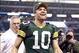 Dec 15, 2013; Arlington, TX, USA; Green Bay Packers quarterback Matt Flynn (10) smiles as he leaves the field after the game against the Dallas Cowboys at AT&T Stadium. Packers beat Cowboys 37-36. Mandatory Credit: Tim Heitman-USA TODAY Sports