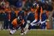 DENVER, CO - DECEMBER 12: Place kicker Matt Prater #5 of the Denver Broncos kicks a 42-yard field goal on a hold by Britton Colquitt #4 during the fourth quarter against the San Diego Chargers at Sports Authority Field Field at Mile High on December 12,