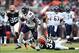 Dec 15, 2013; Cleveland, OH, USA; Chicago Bears wide receiver Brandon Marshall (15) gets away from Cleveland Browns cornerback Jordan Poyer (33) during the second quarter at FirstEnergy Stadium. Mandatory Credit: Andrew Weber-USA TODAY Sports
