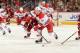 GLENDALE, AZ - DECEMBER 14: Jeff Skinner #53 of the Carolina Hurricanes skates the puck up ice while being chased by Tim Kennedy #34 of the Phoenix Coyotes at Jobing.com Arena on December 14, 2013 in Glendale, Arizona. (Photo by Norm Hall/NHLI via Getty
