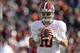Nov 30, 2013; Auburn, AL, USA; Alabama Crimson Tide quarterback AJ McCarron (10) warms up prior to the game against the Auburn Tigers at Jordan Hare Stadium. Mandatory Credit: John David Mercer-USA TODAY Sports