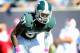 Oct 12, 2013; East Lansing, MI, Michigan State Spartans cornerback Darqueze Dennard (31) looks over Indiana Hoosiers offense during the second half in a game at Spartan Stadium. MSU won 42-28. Mandatory Credit: Mike Carter-USA TODAY Sports